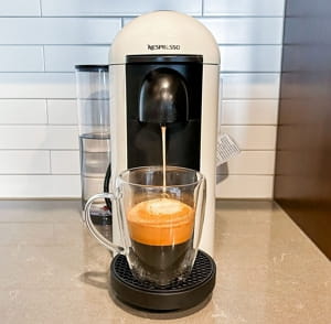 Nespresso VertuoPlus capsule coffee machine with rounded motorized head